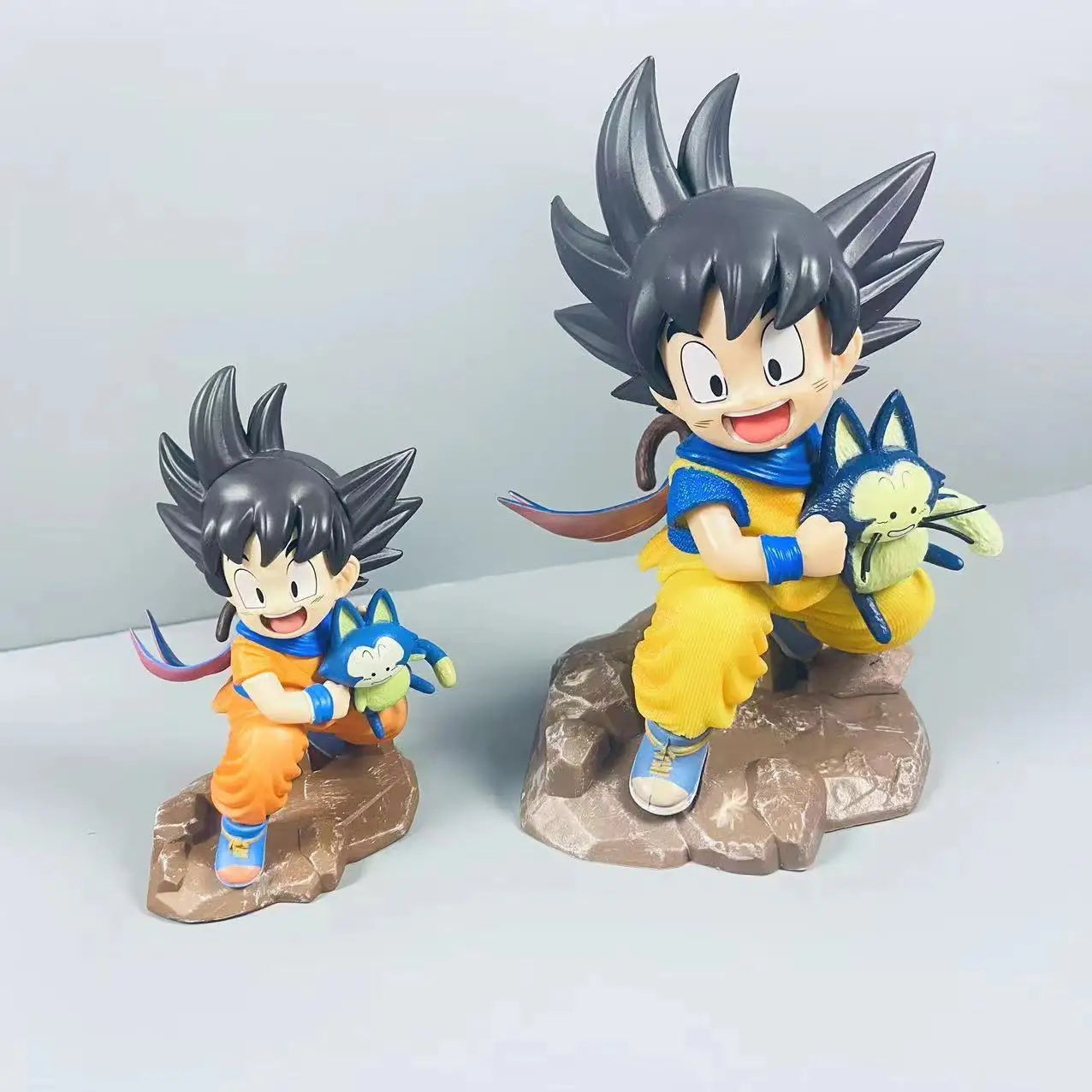 Dragon Ball Little Goku PVC Figure – Childhood Hugging Puer Ya Mu Tea Follower Collectible Model Statue