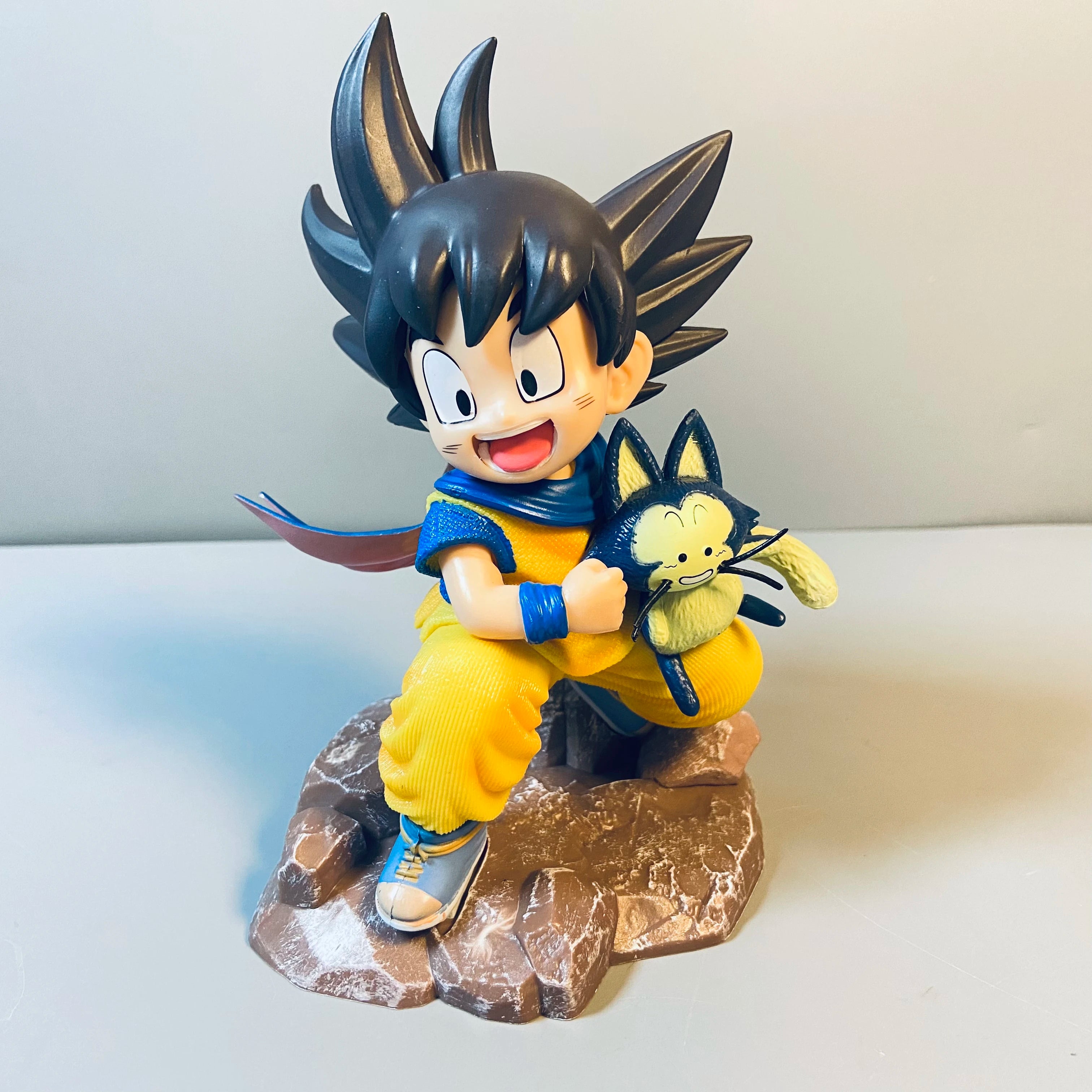 Dragon Ball Little Goku PVC Figure – Childhood Hugging Puer Ya Mu Tea Follower Collectible Model Statue